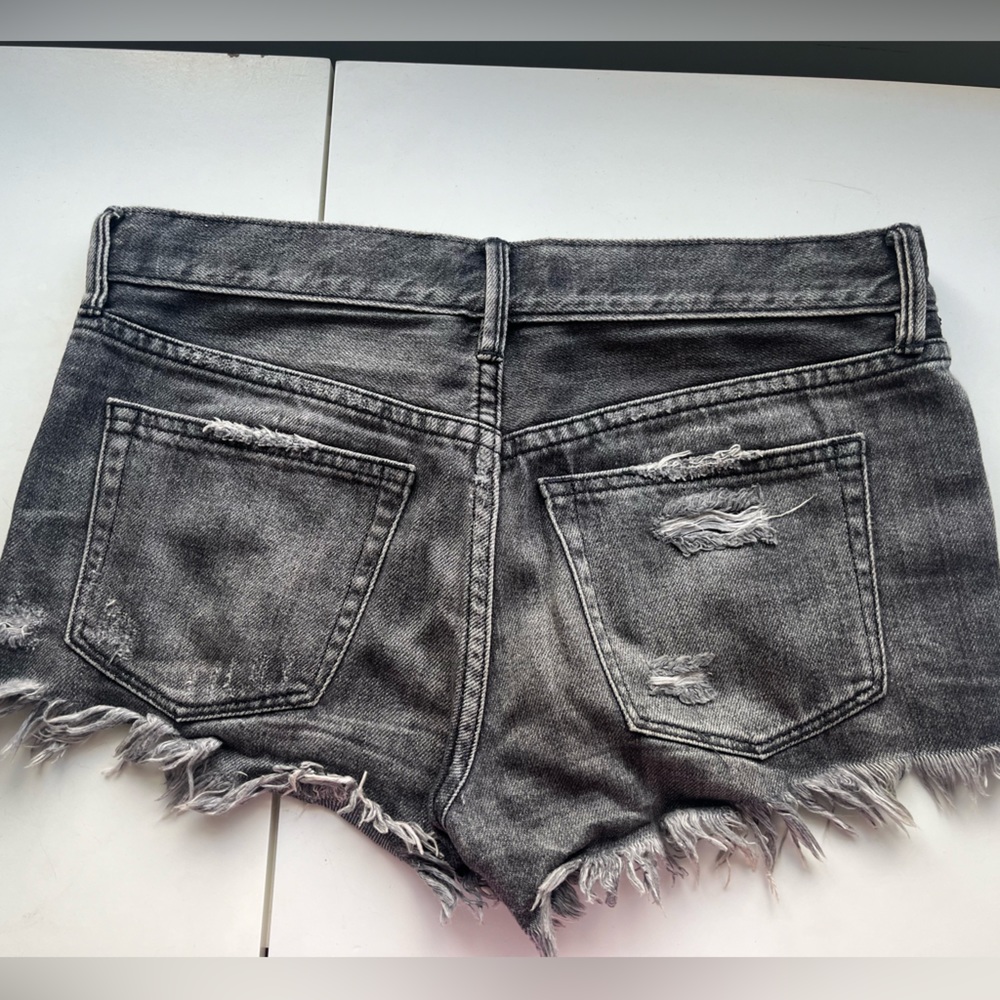 Free people distressed black denim shorts